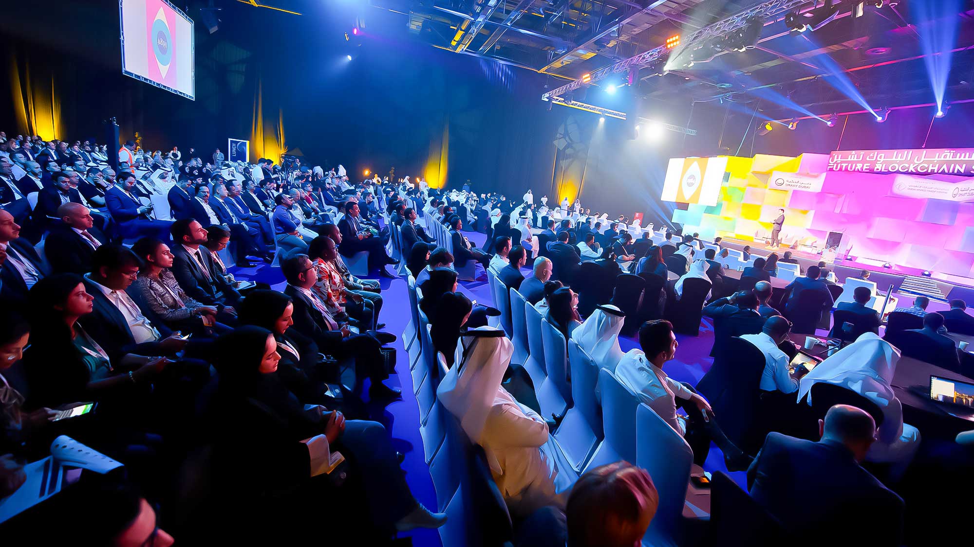 Primer Crypto on stage at a blockchain summit in Dubai